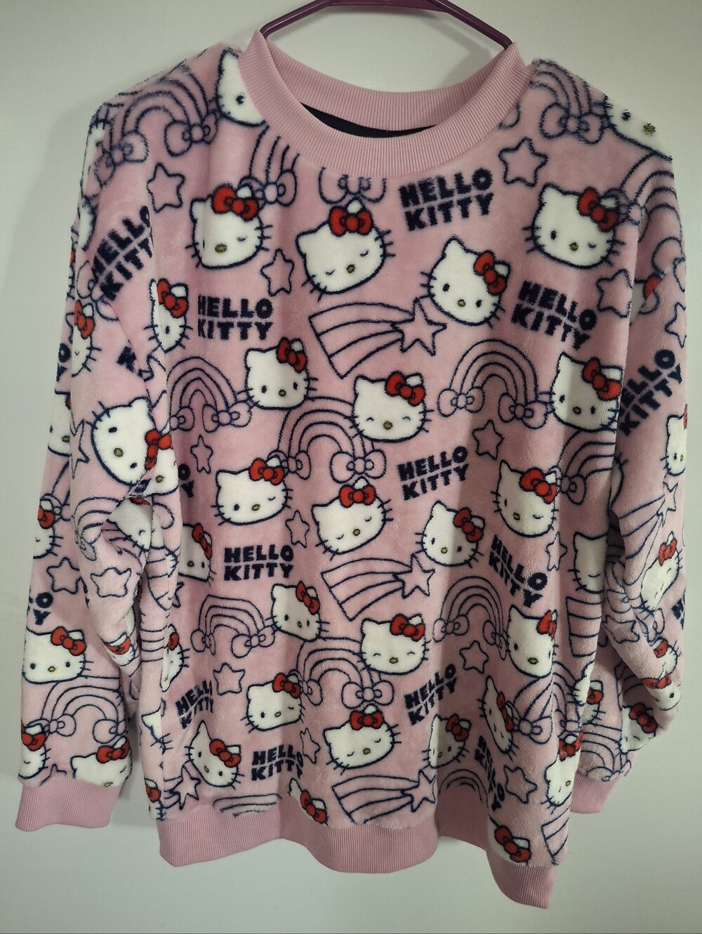 Hello Kitty Pink Plush Crewneck Sweater with Red Bow Accents